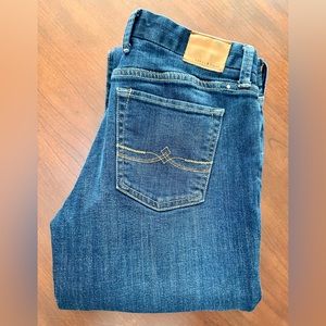 Lucky Brand Sweet Jean Boot. Medium wash. Mid-rise. Size 6/28L.